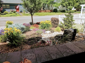 View from front porch to street & water fountain

