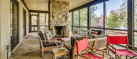 Porch with fireplace for relaxing. 