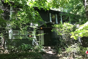 Woodland House in the summer.