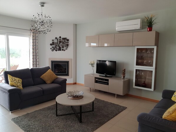 Spacious living area with patio doors onto the front patio