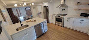 Kitchen view into living room.