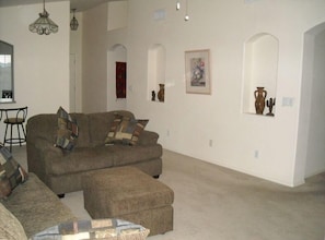 Living Room is bright and nice and has new funiture! Direct TV Now Included!