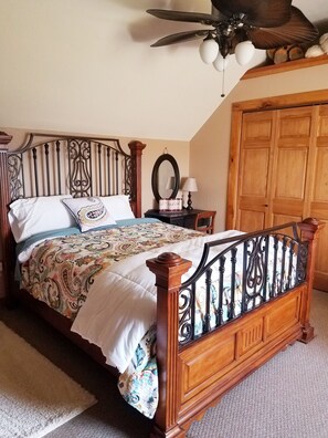 upstairs bedroom 2 with window seat and electric fireplace