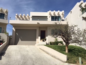 free standing condo in gated community with 24/7 guard on duty 