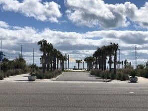 Entrance to beach directly across from condo accessed by crosswalk at light.