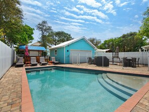 Private Pool Area with Chaise Lounge Chairs and TiKi Bar