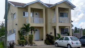 Front view of Townhouse with Small car available for rental.