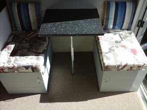 Dining area turns into a small bed