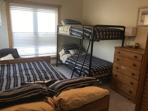 Second bedroom upstairs w twin bunks and full bed