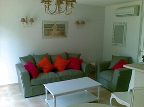 Kick back your feet and relax in the cozy living area.