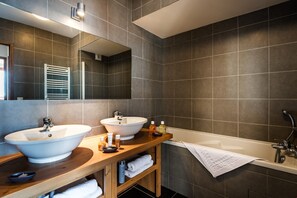 Get ready for your day in the lovely bathroom.