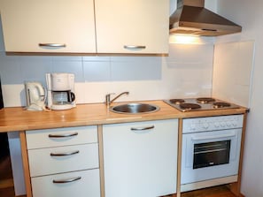 Countertop, Cabinetry, Keuken, Kamer, Meubilair, Eigendom, Major Appliance, Fornuis, Huishoudapparatuur, Gasfornuis