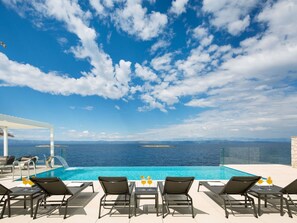 Sky, Blue, Property, Turquoise, Vacation, Furniture, Resort, Cloud, Azure, Outdoor Furniture