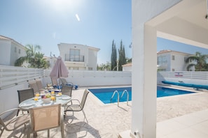Garden with barbecue, seating area, sunloungers and private pool
