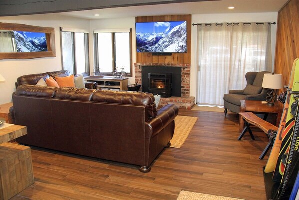 Mammoth Condo Rental Wildflower 41: Beautifully Remodeled Living Room With A Pellet Stove And Access To A Private Deck.