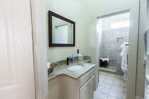 Bathroom with double closet and shower 