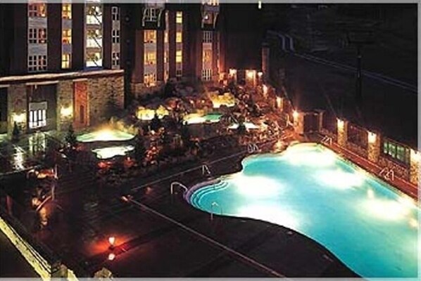 View of heated pool at night.  
