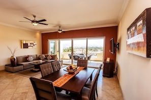 Beautiful & large great room. Opens to hills & ocean view deck w/ BBQ & dining