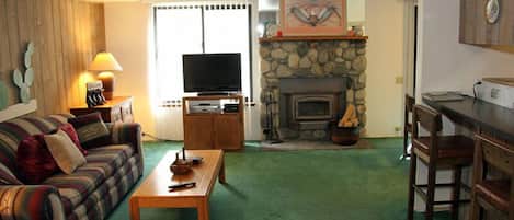 Mammoth Lakes Condo Rental Sunshine Village 177 - Open Living Room with Woodstove