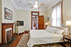 Bedroom #1 with king sized bed and flat screen TV.