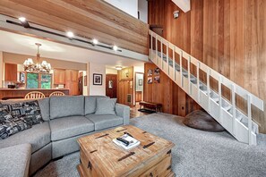Living room and stairs to the loft