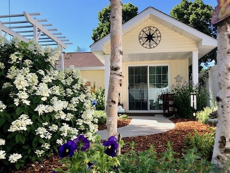 Entry door to The Cottage & private gardens.