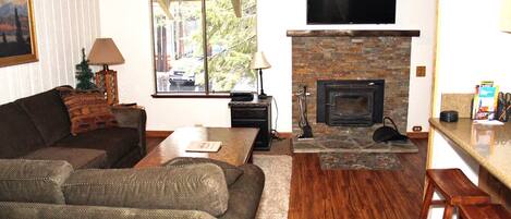 Mammoth Lakes Rental Sunshine Village 150 - upgraded living room with a flat screen TV and woodstove
