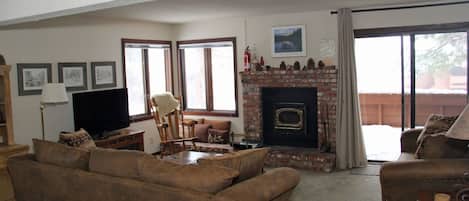 Mammoth Lakes Condo Rental Sunrise 14 - Living Room has a Woodstove