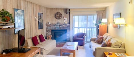 Mammoth Condo Rental Chamonix 45 - LR with Fireplace and Outside Deck Access