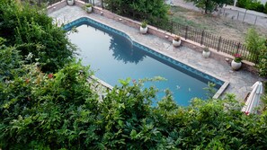 The pool at the lowest level of the garden. Cool getaway for the summer months!