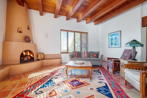 Converted gas kiva fireplace makes it easy to use and enjoy year-round!