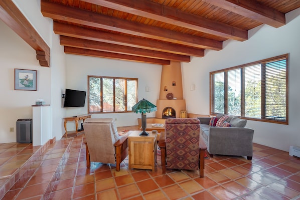 Spacious sunken living room with a pull out memory foam mattress!