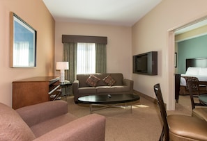 Relax and rejuvenate in the cozy living room of our lovely Orlando suite.