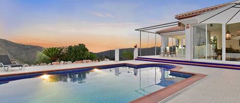 Pool with salt water system. 
The Mediterranean in background.