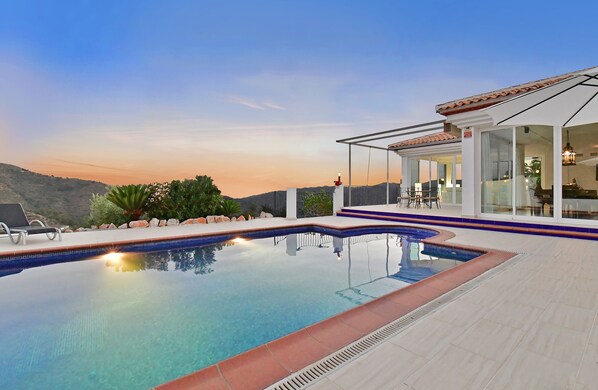 Pool with salt water system. 
The Mediterranean in background.