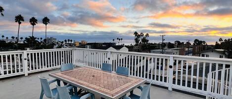 Enjoy your meals on the roof deck while catching the sunset over the Pacific.
