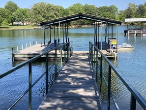 Dock has 10' boat wide slip. Lighted pole with electric outlet near dock
