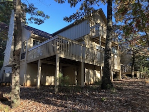 Back view of town home with storage for kayaks or bikes - can provide lock