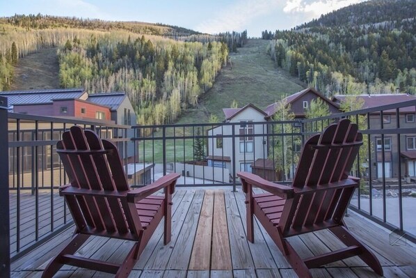 Your own private deck from the primary suite overlooks the Telluride ski area.