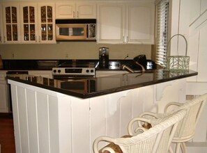 Breakfast bar  for extra seating and lazy morning coffee time!