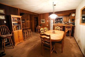 Dining Room with beautiful Pine table with built in table leaf that seats 8.