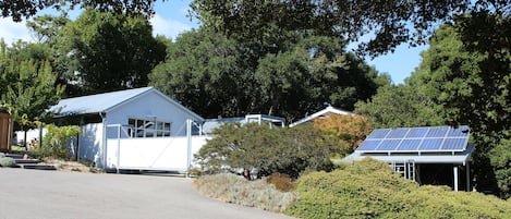 Courtyard entrance and carport under solar panels