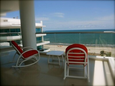 Relax on the balcony with expansive views of the beautiful Caribbean