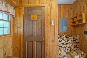 This is the foyer where the wood is located for the wood fireplace.