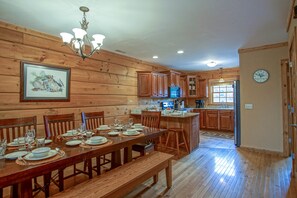 The dining room and kitchen.