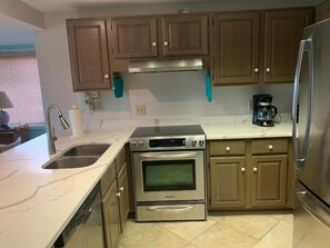 Kitchen with new granite countertops 