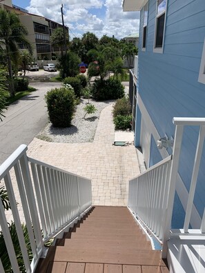 Flamingo House staircase to front door