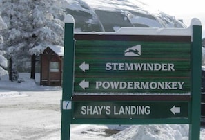 Turn left when you see this sign at Snowshoe Village.  Gated parking lot.  Park in front of your townhouse.