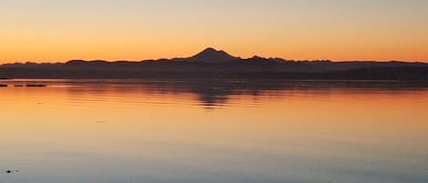 Sunrise on Griffin bay silhouetting Mt. Baker. 