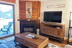 Living Area w/ Fireplace and TV